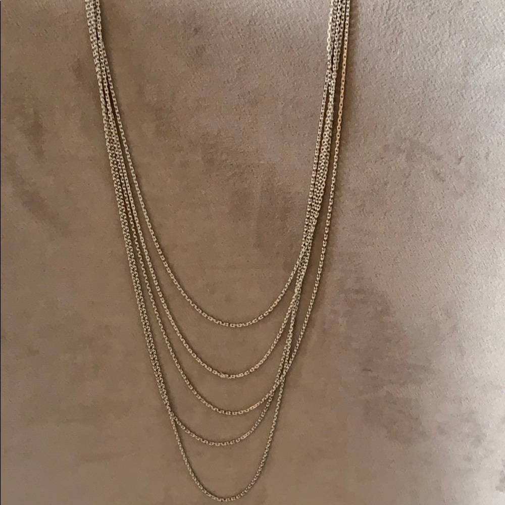 Long gold and white necklace